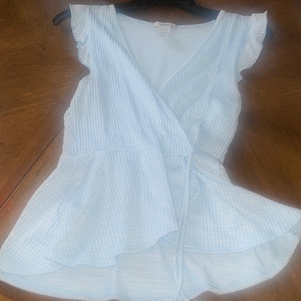 Peplum style Sleeveless shirt